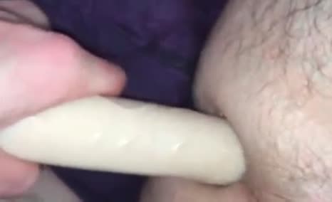 Dildoing his ass until he shits