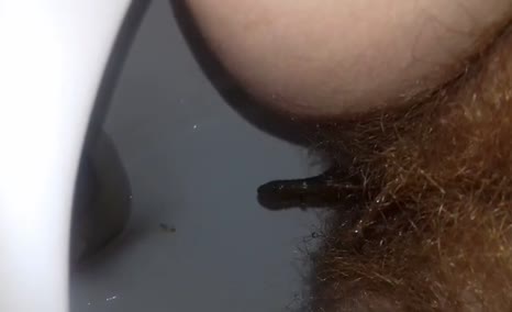 Hairy babe pooping